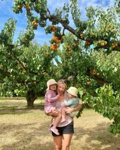 family having a great time in our cheeki cherries orchard